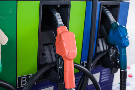 Colorful fuel oil gasoline dispenser at petrol filling stationの写真素材