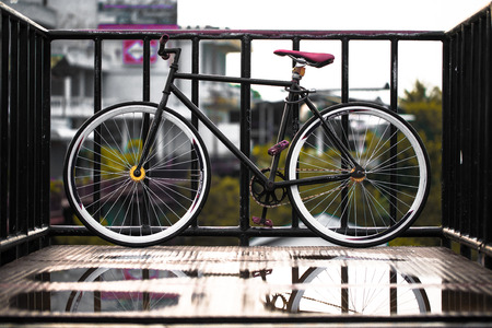 The fix gear bicycle in classic stye, water reflexの写真素材