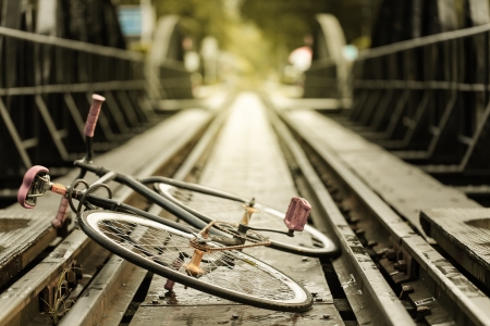 Vintage Bicycle colored on rail,retro fix gearの写真素材