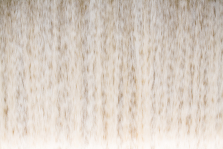 Blurred water flowing over a weir background, gate in damの写真素材