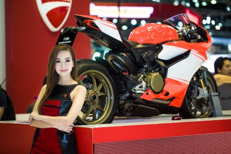 NONTHABURI - DECEMBER 8: Unidentified modellings posted over  Ducati 1199 motorcycle  display on...