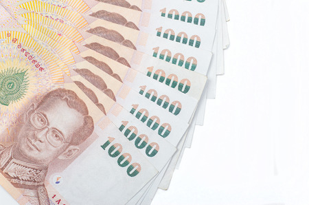 spread of 1000 thai baht money isolated on whiteの写真素材