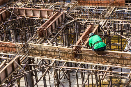 Worker Building & Construction Site in progress to new houseの写真素材