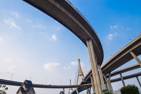 Concrete highway overpass Bhumibol Bridge in Thailand. The bridge crosses the Chao Phraya River twice.の写真素材