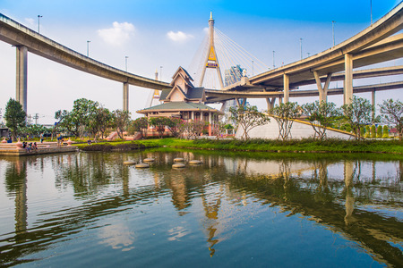 Concrete highway overpass Bhumibol Bridge in Thailand. The bridge crosses the Chao Phraya River twice.のeditorial素材