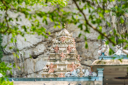 Colorful statue of Hindu God in Batu caves Indian Temple, Kuala Lumpur, Malaysiaの写真素材