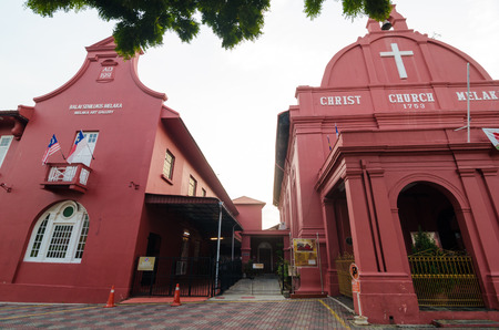 MALACCA, MALAYSIA - OCT 25: Christ Church & Dutch Square with blue sky on October 25, 2014 in Malacca, Malaysia. It was built in 1753 by Dutch & is the oldest 18th century Protestant church in Malaysia.のeditorial素材