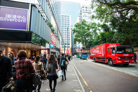 HONG KONG, CHINA - Dec 8: Crowded street view on December 8, 2014 in Hong Kong, China. With 7M population and land mass of 1104 sq km, it is one of the most dense areas in the world.のeditorial素材