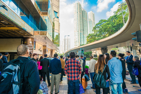 HONG KONG, CHINA - Dec 8: Crowded street view on December 8, 2014 in Hong Kong, China. With 7M...