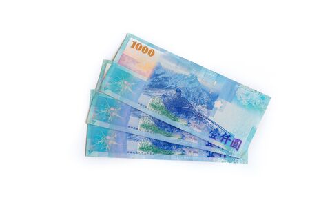 New Taiwan Dollar cash isolated on white backuground close up
