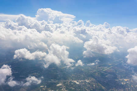 Blue sky white cloud. city with tall buildings. on the sky