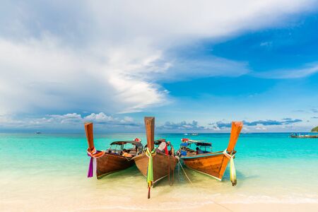Traditional longtail boats in the famous Lipe island, Satun province, Thailandの写真素材