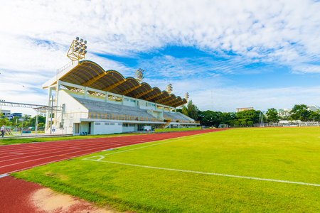 Football field with green grass at sunny day morning blue skyのeditorial素材