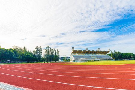 Running track in stadium against blusky, Colourful sport