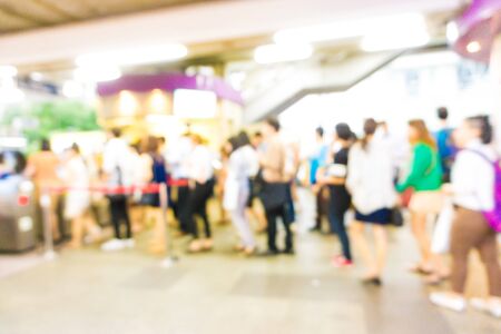 People rush on busy street for public transport