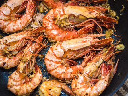 Delicious sea food of grilled prawn in panの写真素材