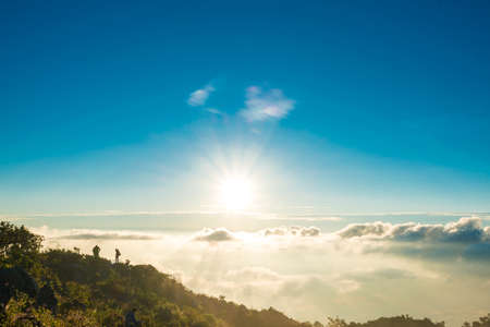 Morning landscape of sunrise over mountains peak with fog, Chiangmai Thailandの写真素材