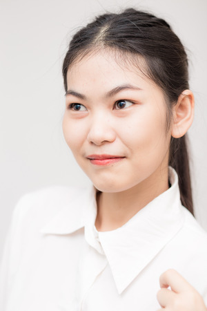 Smiling Asian Caucasian Business Woman. Clos up on faceの写真素材