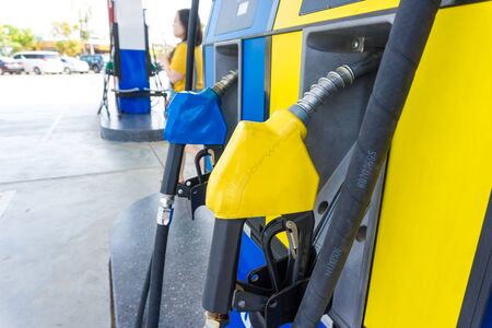 Gasoline Pump nozzles at the gas stationの写真素材