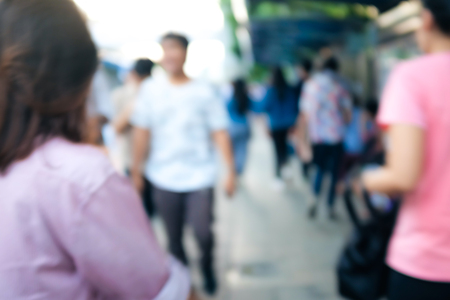 Abstract blurred background of people at bus station after travel in Thailandの写真素材