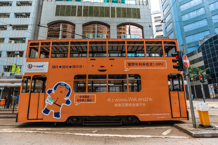 HONG KONG - OCTOBER 25, 2015: Hong Kong double-decker tram in Central. Trams in Hong Kong is the cheapest mode of public transport on the islandのeditorial素材
