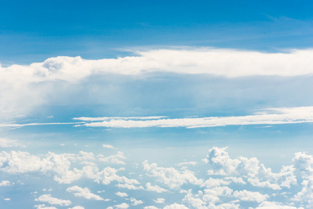 blue sky background with tiny clouds, View from above airplane