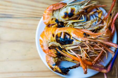 Grilled big shrimps, Seafood on table