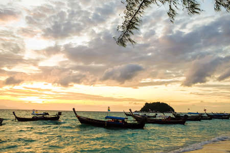 Sunrise at ocean with fishery boat in Lipe, Thailandのeditorial素材