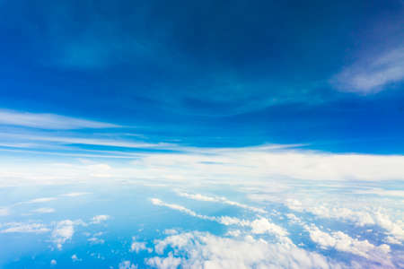Blue sky and Clouds looking from the Airplane in morningの写真素材