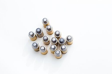 Cartridges of pistols ammo lead bullet on white background