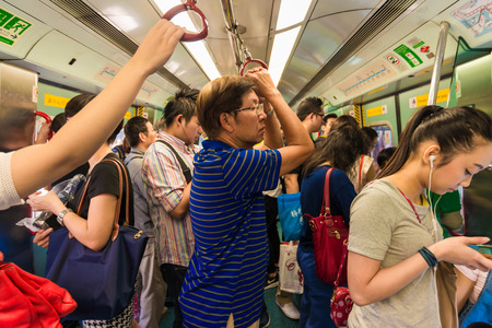 HONG KONG - OCTOBER 24: Subway train station on October 24, 2015 in Central, Hong Kong. MTR is the most popular transport in Hong Kongのeditorial素材