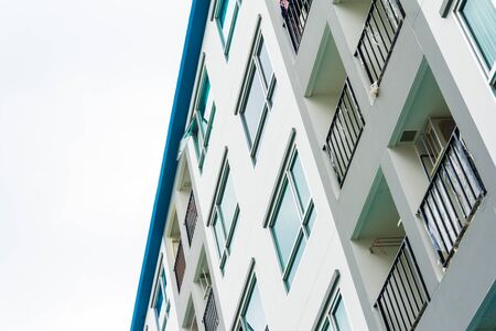 Apartment building low rise close up on white cloud, Condominium construction
