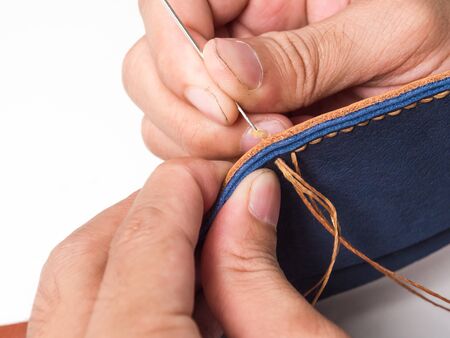 How to make Hand made leather man wallet on wooden background