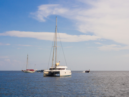 yacht and blue water Andaman sea, Thailandの写真素材