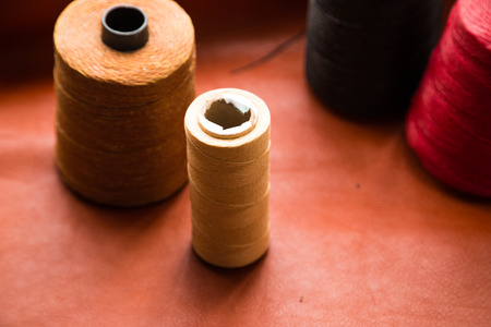 Background of leather craftsmanship with tool for handmade productの写真素材