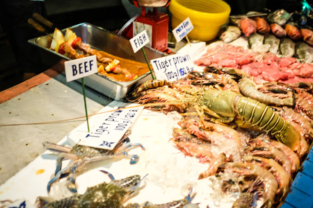 Fresh wild seafood show on shop, Fish Tiger prawn and other seafoodの写真素材