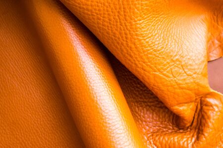 Genuine full grain leather tan color colose up background, Cowhide for craftsman