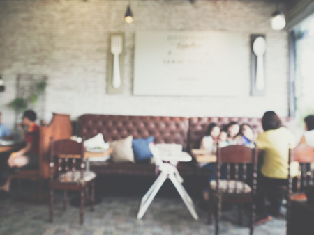 Abstract blur modern loft coffee shop background with people vintageの写真素材