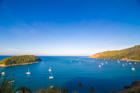 Naiharn bay with yatch boat at windmill viewpoint ,Phuket Province Thailandの写真素材