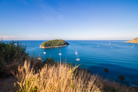 Naiharn bay with yatch boat at windmill viewpoint ,Phuket Province Thailandの写真素材