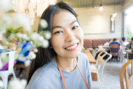 Women sitting in cafe for leisure and rest time, Portrait hipster womenの写真素材