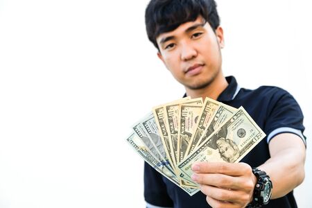 Man hold US dollar currency bill investment isolated on white backgroundの写真素材