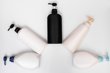 Pump lotion cosmetic bottles on white backgroundの写真素材