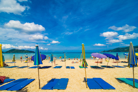 Beach chair summer on island vacation holiday relax in the sun with umbrella. Idyllic travel background.のeditorial素材