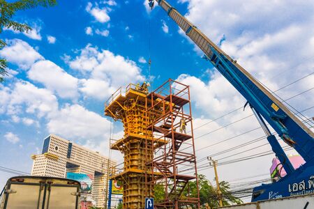 Engineering working on cement pole for train line, Railway constructionのeditorial素材