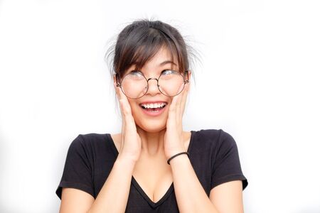 Happy and wonder ladies women wear glasses isolated on white backgroundの写真素材