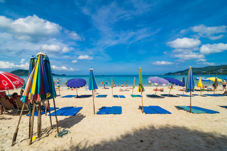 Beach chair summer on island vacation holiday relax in the sun with umbrella. Idyllic travel background.のeditorial素材