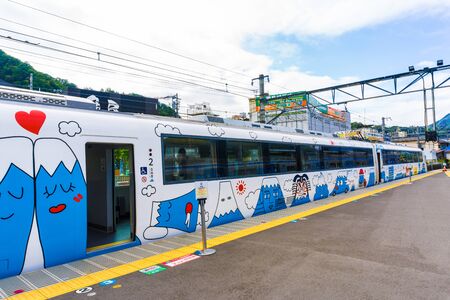 TOKYO, JAPAN - 24 OCT 2016: Fujisan Express train with Fujikyu Railway Local train at Fujikyu Railway station.The railway system is one of the most important public transportation in Japan.のeditorial素材