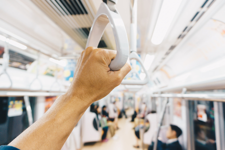 Blurred people in train car, Tokyo subwayの写真素材