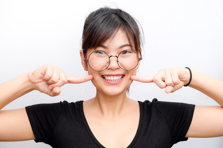 Smiling glasses asian confident fashion women on white background
